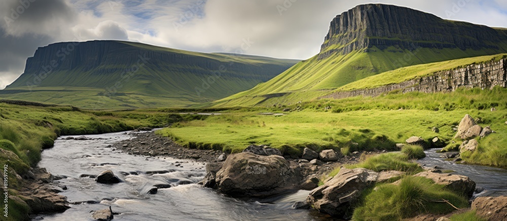 Poster Stream flowing through distant mountain landscape