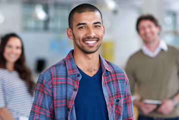 Obraz premium Man, employee and happy in office on portrait for career or job growth and opportunity graphic designer. Employees, people and smile or confident with teamwork and collaboration in digital agency