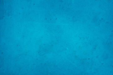 Dark blue concrete stone texture for background in summer wallpaper. Cement and sand wall of tone vintage design.