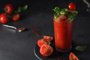 A glass with cold bloody mary cocktail