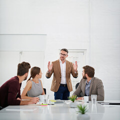 Business people, teamwork and meeting in office for strategy for project management, information and client feedback. Discussion, conversation and creative ideas for collaboration on company task. © peopleimages.com