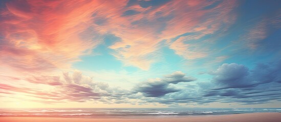 In the morning on the beach thick red tinged clouds can be seen in the East providing a captivating backdrop for a copy space image
