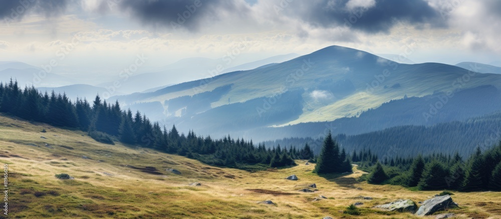 Sticker Scenic mountain slopes with forests meadows and cloudy skies on display in a view from the summit of Mount Hoverla featuring ample copy space image