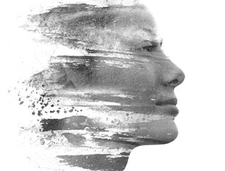 A profile of a young woman merging into brush ink strokes in paintography