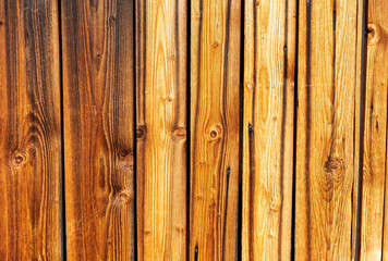 Light brown wooden wall texture on outside wall of mountain hut