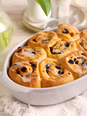 Raisin rolls with icing