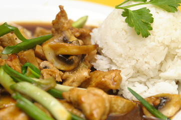 Fried rice with meat and vegetables on a plate, Thai cuisine