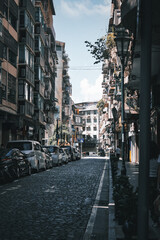 Street view of the old street district and the bustling casino district in Macau, China