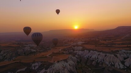 Hot air balloons flying over the Botan Canyon in TURKEY 