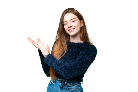 Young pretty woman over isolated chroma key background applauding