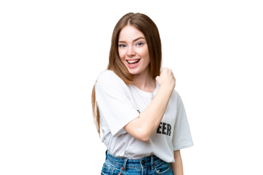 Young volunteer woman over isolated chroma key background celebrating a victory