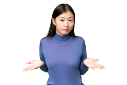 Young Asian woman over isolated chroma key background having doubts