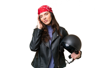 Young caucasian woman with a motorcycle helmet over isolated background with headache