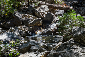 the river foothills of the famous bridalveil fall at Yosemite national park at a sunny summer day.