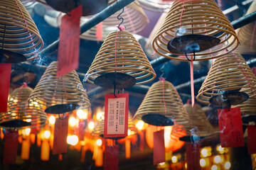 many different oriental lanterns and lamps on display in a chinese temple