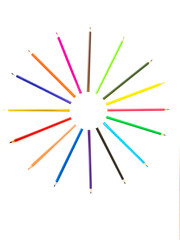 sun made of coloured lapides on a white background