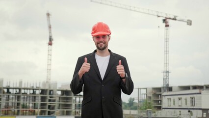 Portrait of young foreman working at construction site