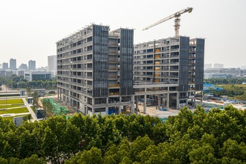 High-rise university teaching building under construction, Wuhan, China. © Wirestock