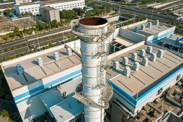 Staircase leading up the side of an industrial chimney in a thermal power plant