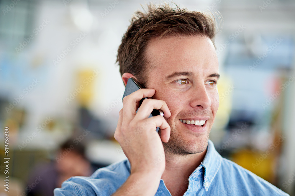 Poster Man, employee and smile in office with phone call for communication or networking as website designer. Business, happy and confident with conversation for project in digital agency and proud