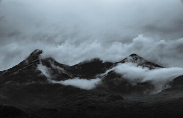 Misty Majesty: Stormy Skies and Cloud-Kissed Peaks of the Cuillin Hills