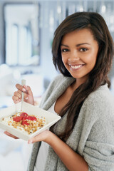 Fruit, cereal and portrait of woman with breakfast for benefits of vitamin c, nutrition and diet in...