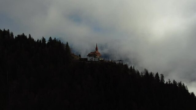 Drone view of the Harder Kulm in Interlaken on a misty day