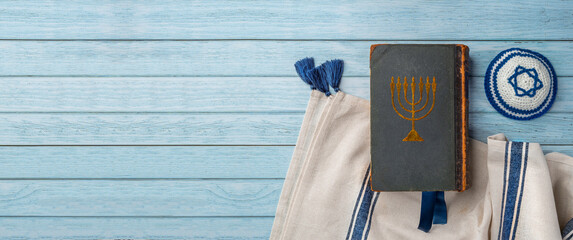 Old book Talmud, Hebrew Rabbinic Judaism, Jewish religious law. Torah, Hebrew Bible. Menorah on a...
