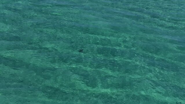 the clear water with calm ripples of the sea at Pristine Beach of Caion in La Coruna, Spain