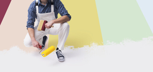 Professional painter and colored paint stripes © stokkete