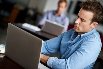 Business man, laptop and research as web designer or online brainstorming, solution or developer....