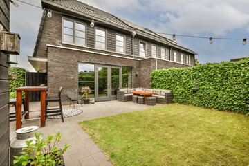 Suburban Backyard with Cozy Patio Setup