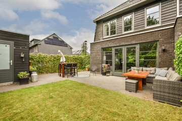 Suburban Backyard with Cozy Patio Setup