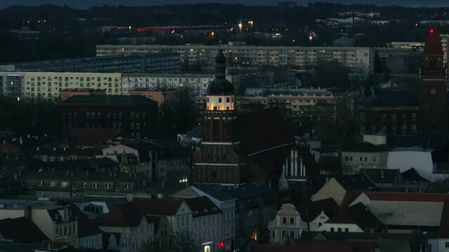Drone shot of Spremberg tower and castle church with the residential buildings of Cottbus city