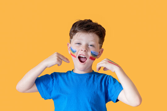 Young boy with face paint - Powered by Adobe