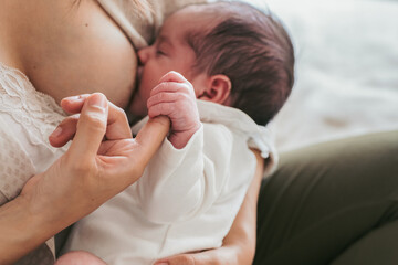 Tender moment between mother and newborn baby