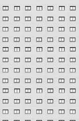 Rows of windows of a modern residential building.