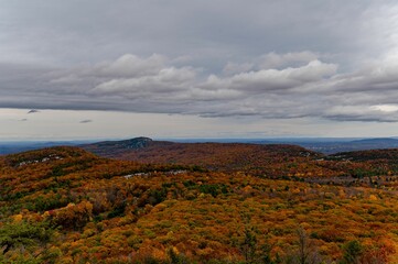 the landscape is a mixture of red, yellow, green and blue