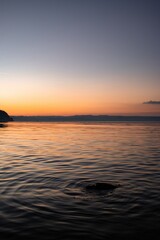an image of some very nice water during the sunset time