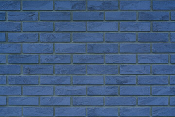 Close-up of a textured blue brick wall