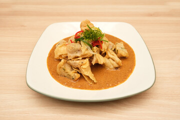 Batagor, made from fish or chicken dumpling, tofu, tapioca flour served with peanut sauce. Indonesian food
