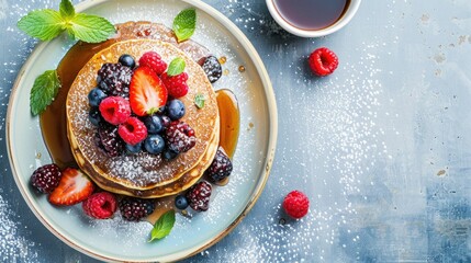 A stack of pancakes topped with strawberries and blueberries on a plate. The perfect combination of sweet fruit and fluffy pancakes, a delicious breakfast choice AIG50