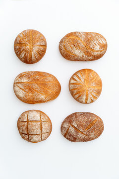 Assorted Sourdough Breads on White Background