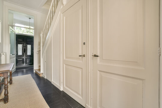 Elegant hallway with black and white color scheme