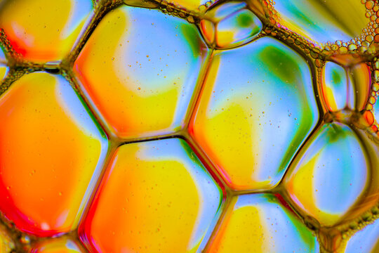 extremely colourful macro image of soap bubbles