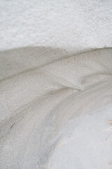 Dune Sand Ripple Closeup Texture in Cold Winter Morning Sunlight with Shallow Depth of Field