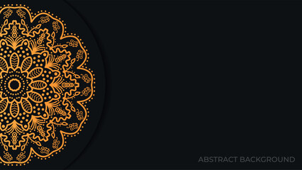 gold mandala ornament on black background