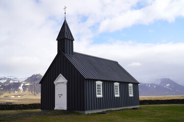The little clack church of Budir, Budakirkja Beach church. Snaefellsnes peninsula, west Iceland