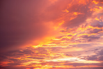 Fototapeta premium Beautiful , luxury soft gradient orange gold clouds and sunlight on the blue sky perfect for the background, take in everning,Twilight, Large size, high definition landscape photo
