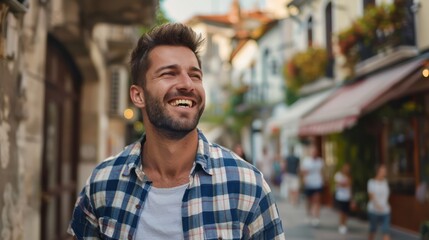 Obraz premium A happy man takes a leisurely stroll through the picturesque town, his relaxed expression indicative of the peace and contentment that come from regular exercise and outdoor recreation. 